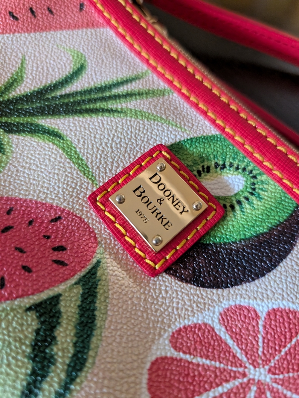 Dooney & Bourke Pink & Green Tropical Fruit Wristlet with Gold Plaque